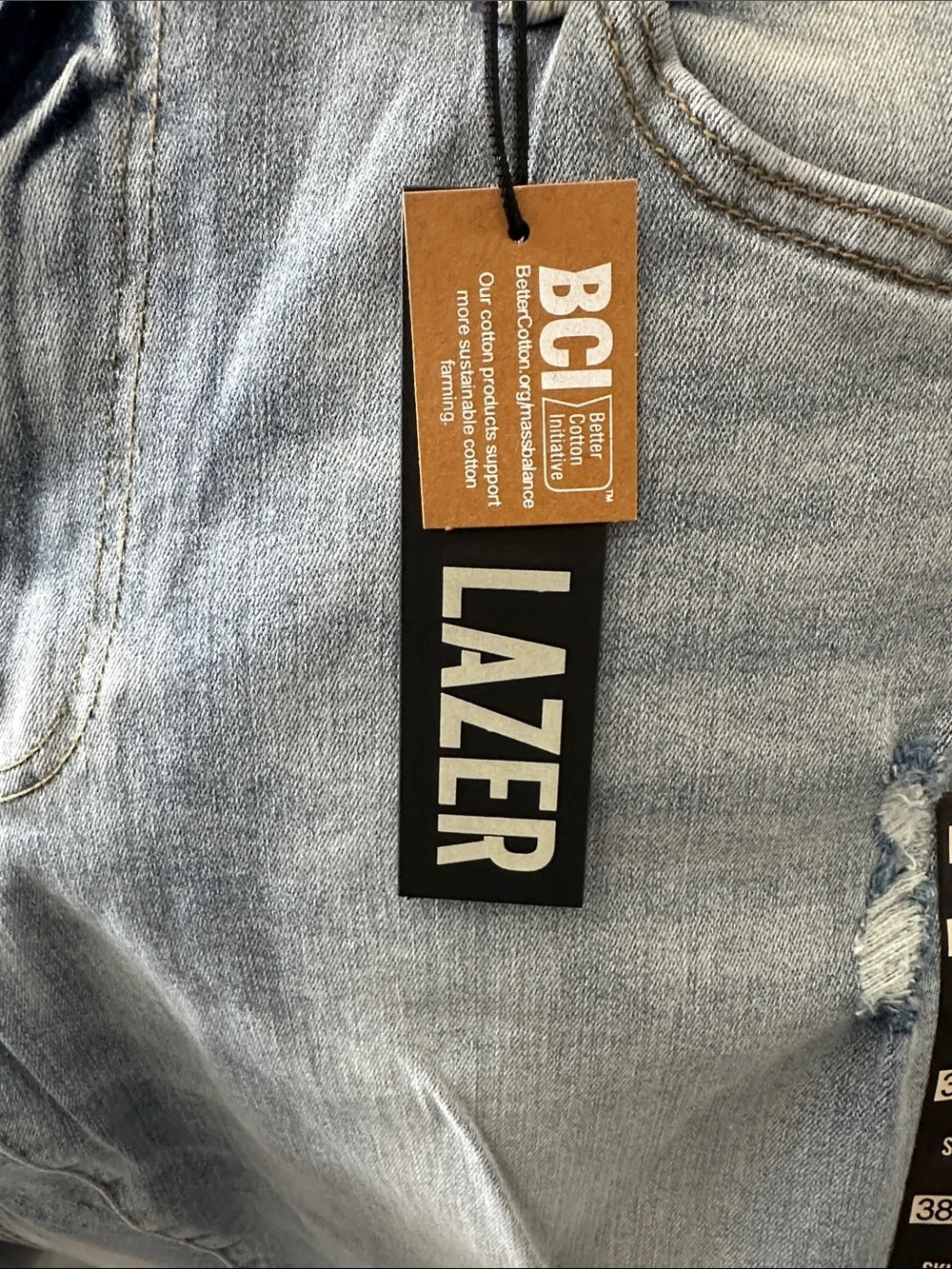 LAZER Men’s Light Blue Skinny Jeans with Distressed Details